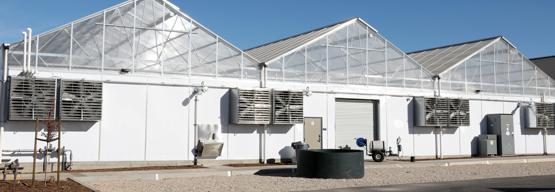 therma glas opaque panels exterior view of greenhouse